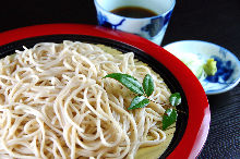 Buckwheat noodles served on a bamboo strainer