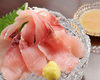 Slices of carp sashimi rinsed in cold water