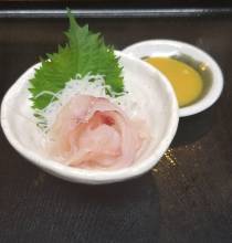 Slices of carp sashimi rinsed in cold water