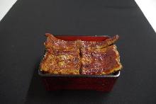 Extra premium eel served over rice in a lacquered box