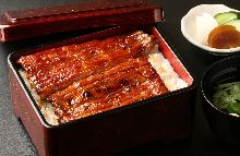 Extra premium eel served over rice in a lacquered box