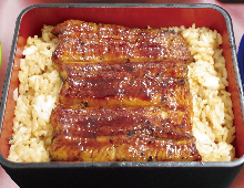 Eel served over rice in a lacquered box