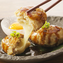 Meatballs served with egg yolk