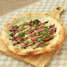 Teriyaki duck pizza