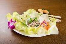 Ground pork and herbs salad lettuce wraps