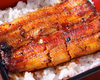 Extra premium eel served over rice in a lacquered box