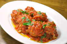 Simmered in tomato sauce