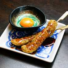 Grilled meatball skewer with egg yolk