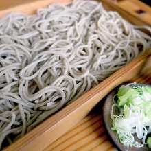 Buckwheat noodles served on a bamboo strainer