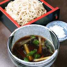 Buckwheat noodles served on a bamboo strainer