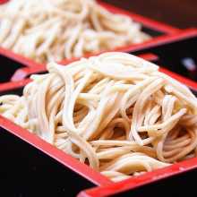 Buckwheat noodles served on a bamboo strainer