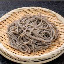 Buckwheat noodles served on a bamboo strainer