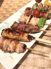 Assorted grilled chicken skewers