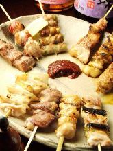 Assorted grilled chicken skewers