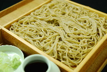 Buckwheat noodles served on a bamboo strainer