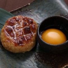 Meatballs served with egg yolk