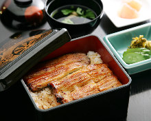 Eel served over rice in a lacquered box