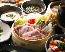 Vegetables and pork steamed in a bamboo steamer