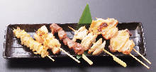 Assorted grilled chicken skewers