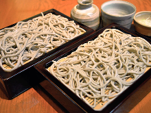 Buckwheat noodles served on a bamboo strainer