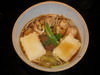 Buckwheat noodles served on a bamboo strainer with chicken