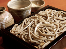 Buckwheat noodles served on a bamboo strainer