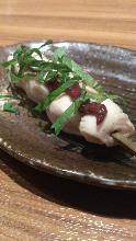 Skewered chicken tenderloin with plum and perilla