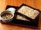 Duck Seiro (plain buckwheat noodles served with wasabi and dipping sauce on the side) with duck, served on layered basket steamer