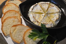 Oven-baked camembert cheese