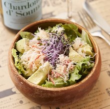 Caesar salad with smoked salmon and avocado