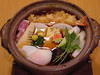 Wheat noodles boiled in a ceramic pot