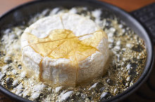 Grilled camembert cheese with honey topping
