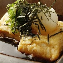 Deep-fried rice cake in broth