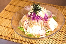 Radish salad with tofu and rice crackers