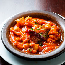 Beef tripe and beans stewed in tomato sauce