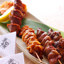 Assorted grilled chicken skewers