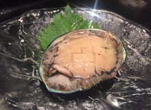 Grilled live abalone