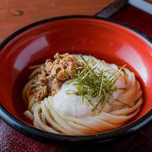 A bowl of chilled udon with soft-boiled egg