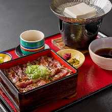 Wagyu beef steak in a lacquered box, with boiled tofu