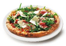 Prosciutto and arugula pizza