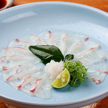 Thinly sliced sea bream sashimi