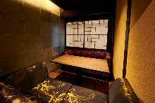 Private room with a sofa seat featuring Nishijin-ori, a textile with 1,500 years of history