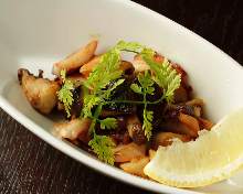 Stir-fried octopus and mushroom with garlic butter