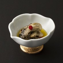 Oysters marinated in olive oil
