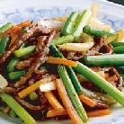 Stir-fried beef and garlic scapes