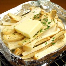 Grilled eringi mushrooms with butter