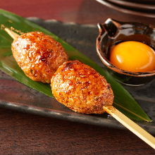 Meatballs served with egg yolk