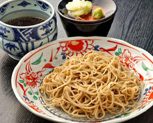 Buckwheat noodles served on a bamboo strainer