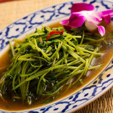 Stir-fried pea shoots with oyster sauce