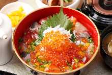 Seafood rice bowl topped with whitebait